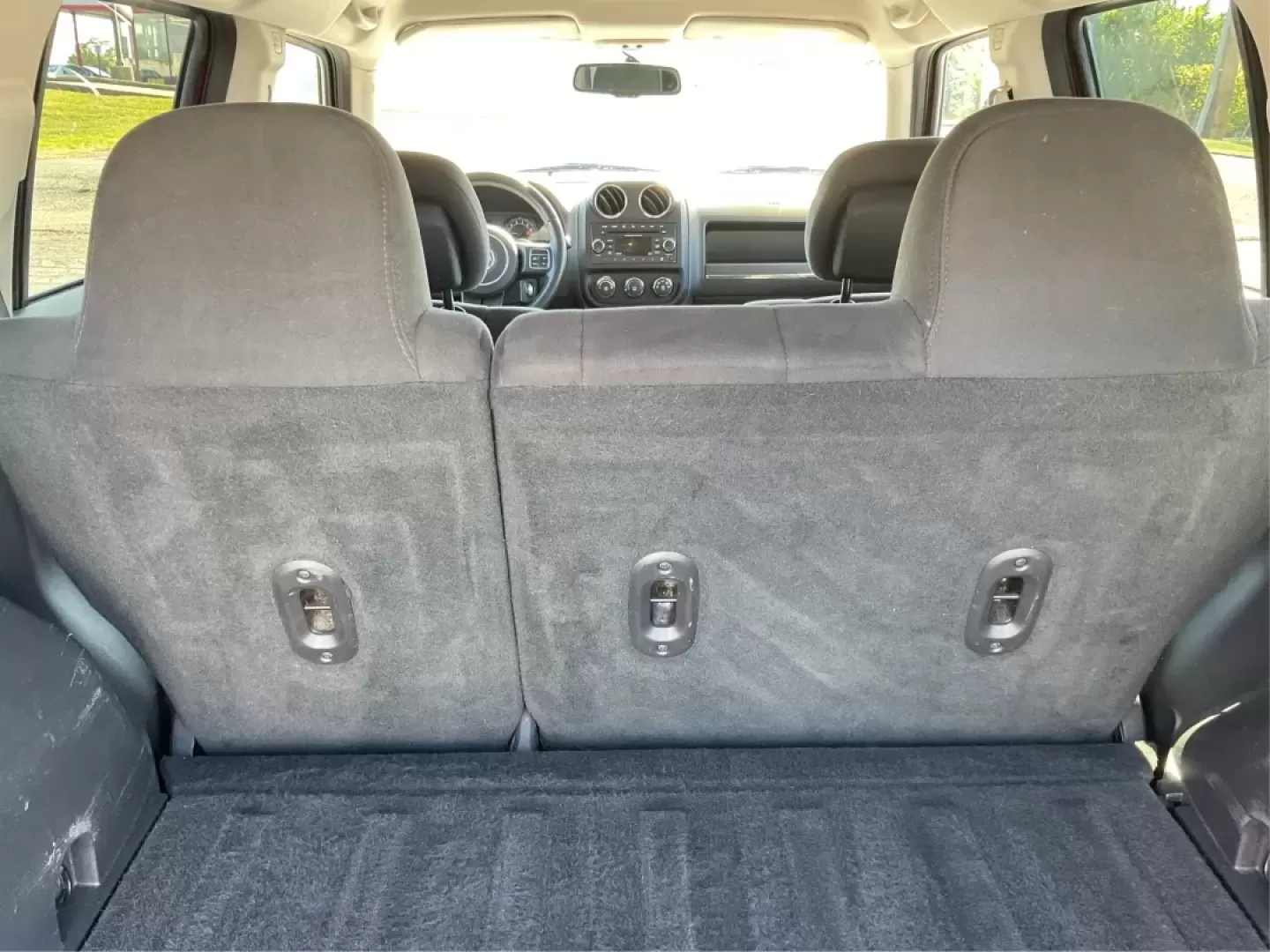2015 Jeep Patriot Latitude (1C4NJRFB0FD) with an 2.4L I-4 DOHC engine, located at 401 Woodman Dr, Riverside, OH, 45431, (937) 908-9800, 39.760899, -84.123421 - **Adventure Awaits with the 2015 Jeep Patriot Latitude Your Perfect Companion for Every Journey!**<br /> <br /> At Advantage Car and Credit - Riverside, located at 401 Woodman Dr, Riverside, OH 45431, we understand that life is an adventure, whether it's gearing up for a weekend getaway or managing - Photo#12
