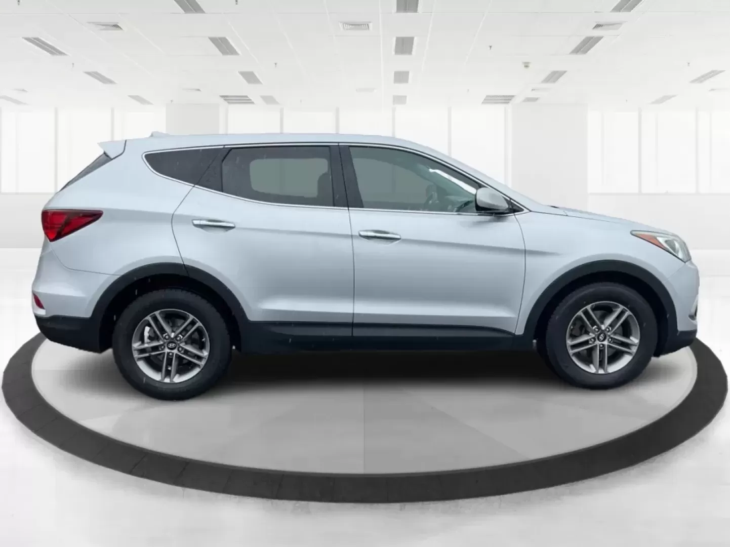 2017 Hyundai Santa Fe 2.4L (5XYZTDLB2HG) with an Theta II 2.4L I-4 gasoline direct injection engine, located at 4508 South Dixie Dr, Moraine, OH, 45439, (937) 908-9800, 39.689976, -84.218452 - Discover the perfect blend of comfort, capability, and style with the 2017 Hyundai Santa Fe, now available at Advantage Car and Credit, located at 1184 Kauffman Ave, Fairborn, OH 45324. This versatile SUV is an excellent choice for growing families, weekend adventurers, or budget-conscious buyers lo - Photo#1