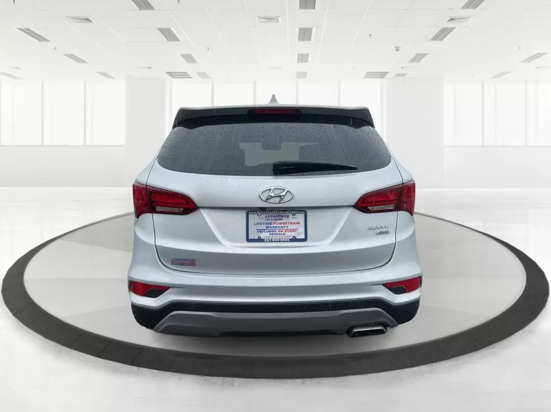 2017 Hyundai Santa Fe 2.4L (5XYZTDLB2HG) with an Theta II 2.4L I-4 gasoline direct injection engine, located at 4508 South Dixie Dr, Moraine, OH, 45439, (937) 908-9800, 39.689976, -84.218452 - Discover the perfect blend of comfort, capability, and style with the 2017 Hyundai Santa Fe, now available at Advantage Car and Credit, located at 1184 Kauffman Ave, Fairborn, OH 45324. This versatile SUV is an excellent choice for growing families, weekend adventurers, or budget-conscious buyers lo - Photo#3