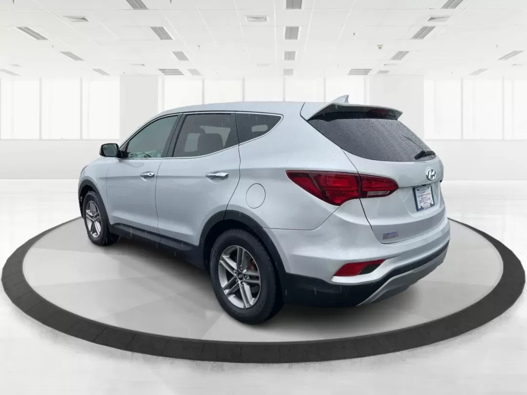 2017 Hyundai Santa Fe 2.4L (5XYZTDLB2HG) with an Theta II 2.4L I-4 gasoline direct injection engine, located at 4508 South Dixie Dr, Moraine, OH, 45439, (937) 908-9800, 39.689976, -84.218452 - Discover the perfect blend of comfort, capability, and style with the 2017 Hyundai Santa Fe, now available at Advantage Car and Credit, located at 1184 Kauffman Ave, Fairborn, OH 45324. This versatile SUV is an excellent choice for growing families, weekend adventurers, or budget-conscious buyers lo - Photo#4