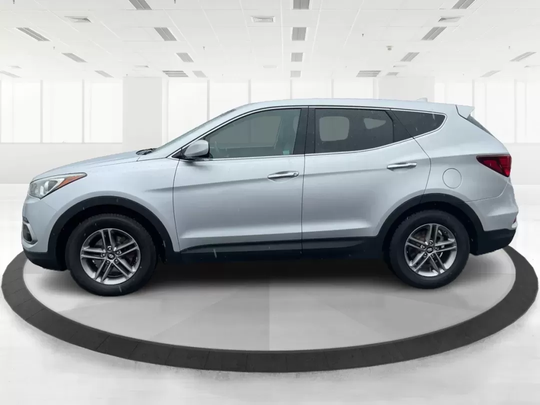 2017 Hyundai Santa Fe 2.4L (5XYZTDLB2HG) with an Theta II 2.4L I-4 gasoline direct injection engine, located at 4508 South Dixie Dr, Moraine, OH, 45439, (937) 908-9800, 39.689976, -84.218452 - Discover the perfect blend of comfort, capability, and style with the 2017 Hyundai Santa Fe, now available at Advantage Car and Credit, located at 1184 Kauffman Ave, Fairborn, OH 45324. This versatile SUV is an excellent choice for growing families, weekend adventurers, or budget-conscious buyers lo - Photo#5