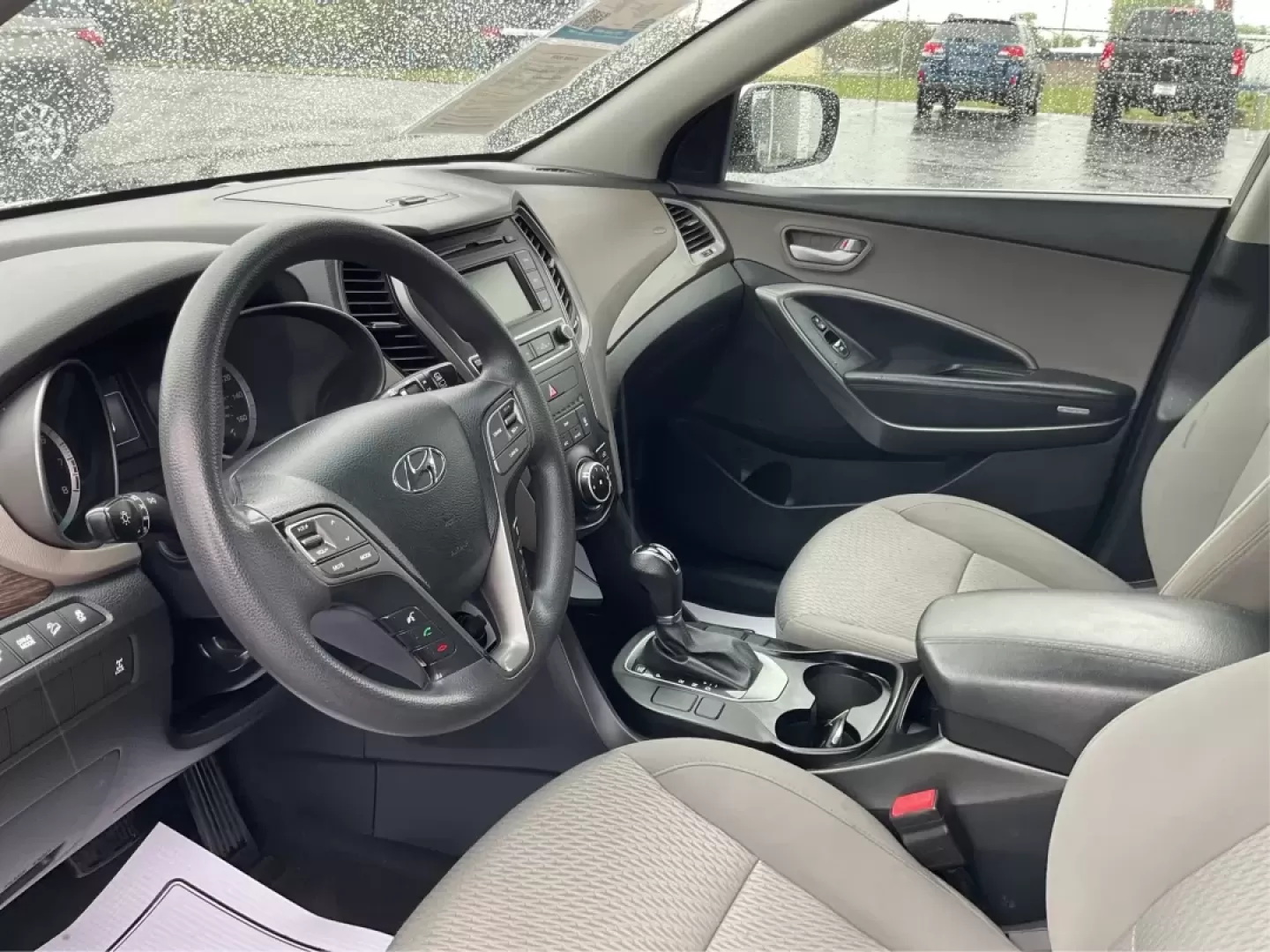 2017 Hyundai Santa Fe 2.4L (5XYZTDLB2HG) with an Theta II 2.4L I-4 gasoline direct injection engine, located at 4508 South Dixie Dr, Moraine, OH, 45439, (937) 908-9800, 39.689976, -84.218452 - Discover the perfect blend of comfort, capability, and style with the 2017 Hyundai Santa Fe, now available at Advantage Car and Credit, located at 1184 Kauffman Ave, Fairborn, OH 45324. This versatile SUV is an excellent choice for growing families, weekend adventurers, or budget-conscious buyers lo - Photo#9