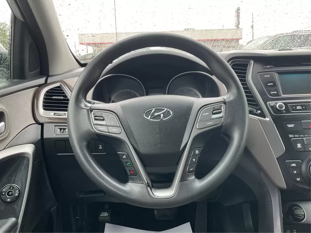 2017 Hyundai Santa Fe 2.4L (5XYZTDLB2HG) with an Theta II 2.4L I-4 gasoline direct injection engine, located at 4508 South Dixie Dr, Moraine, OH, 45439, (937) 908-9800, 39.689976, -84.218452 - Discover the perfect blend of comfort, capability, and style with the 2017 Hyundai Santa Fe, now available at Advantage Car and Credit, located at 1184 Kauffman Ave, Fairborn, OH 45324. This versatile SUV is an excellent choice for growing families, weekend adventurers, or budget-conscious buyers lo - Photo#16