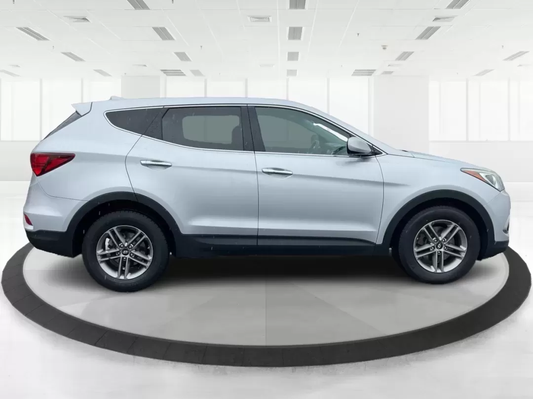 2017 Hyundai Santa Fe 2.4L (5XYZTDLB2HG) with an Theta II 2.4L I-4 gasoline direct injection engine, 6A transmission, located at 1951 S Dayton Lakeview Rd., New Carlisle, OH, 45344, (937) 908-9800, 39.890999, -84.050255 - Discover the perfect blend of comfort, capability, and style with the 2017 Hyundai Santa Fe, now available at Advantage Car and Credit, located at 1184 Kauffman Ave, Fairborn, OH 45324. This versatile SUV is an excellent choice for growing families, weekend adventurers, or budget-conscious buyers lo - Photo#1