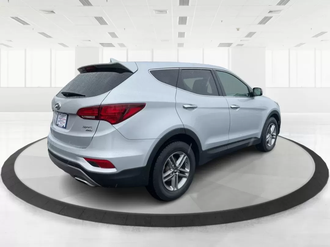 2017 Hyundai Santa Fe 2.4L (5XYZTDLB2HG) with an Theta II 2.4L I-4 gasoline direct injection engine, 6A transmission, located at 1951 S Dayton Lakeview Rd., New Carlisle, OH, 45344, (937) 908-9800, 39.890999, -84.050255 - Discover the perfect blend of comfort, capability, and style with the 2017 Hyundai Santa Fe, now available at Advantage Car and Credit, located at 1184 Kauffman Ave, Fairborn, OH 45324. This versatile SUV is an excellent choice for growing families, weekend adventurers, or budget-conscious buyers lo - Photo#2