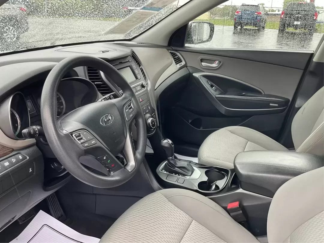 2017 Hyundai Santa Fe 2.4L (5XYZTDLB2HG) with an Theta II 2.4L I-4 gasoline direct injection engine, 6A transmission, located at 1951 S Dayton Lakeview Rd., New Carlisle, OH, 45344, (937) 908-9800, 39.890999, -84.050255 - Discover the perfect blend of comfort, capability, and style with the 2017 Hyundai Santa Fe, now available at Advantage Car and Credit, located at 1184 Kauffman Ave, Fairborn, OH 45324. This versatile SUV is an excellent choice for growing families, weekend adventurers, or budget-conscious buyers lo - Photo#9