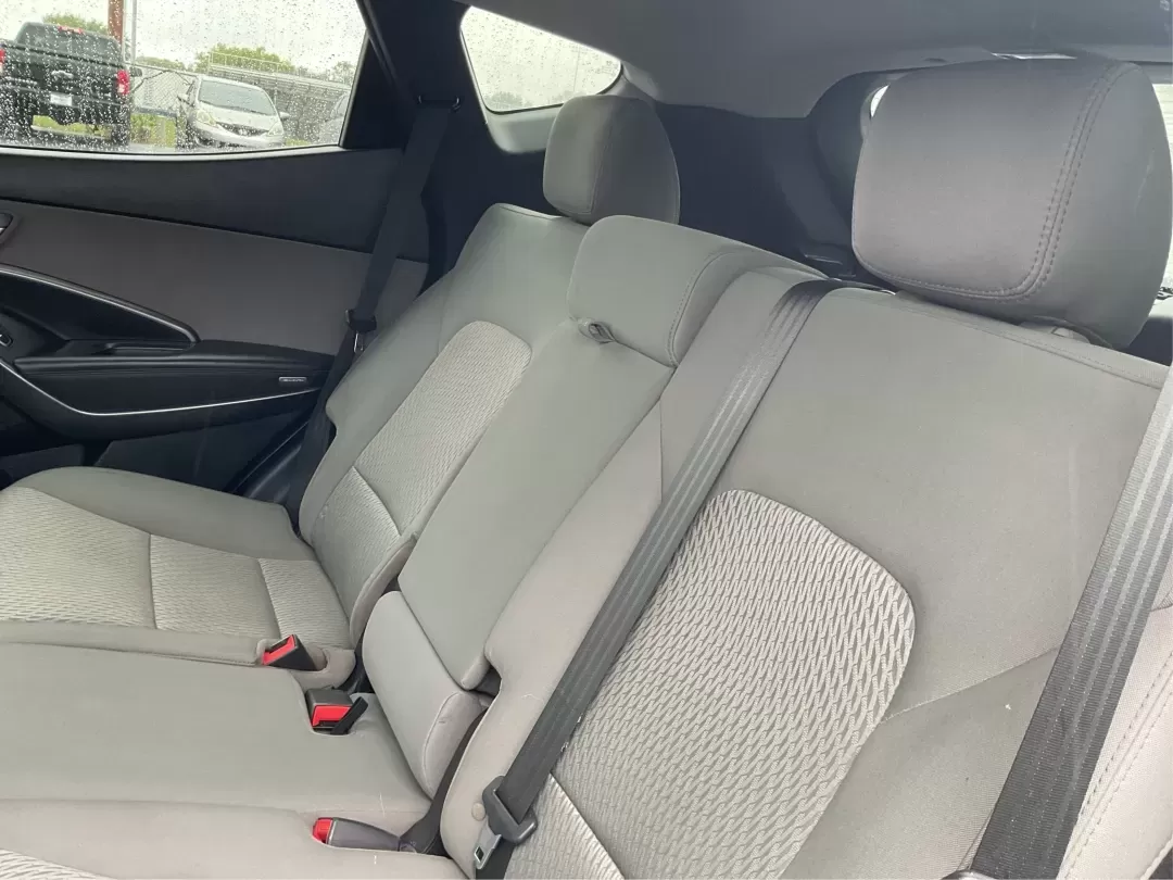 2017 Hyundai Santa Fe 2.4L (5XYZTDLB2HG) with an Theta II 2.4L I-4 gasoline direct injection engine, 6A transmission, located at 1951 S Dayton Lakeview Rd., New Carlisle, OH, 45344, (937) 908-9800, 39.890999, -84.050255 - Discover the perfect blend of comfort, capability, and style with the 2017 Hyundai Santa Fe, now available at Advantage Car and Credit, located at 1184 Kauffman Ave, Fairborn, OH 45324. This versatile SUV is an excellent choice for growing families, weekend adventurers, or budget-conscious buyers lo - Photo#10