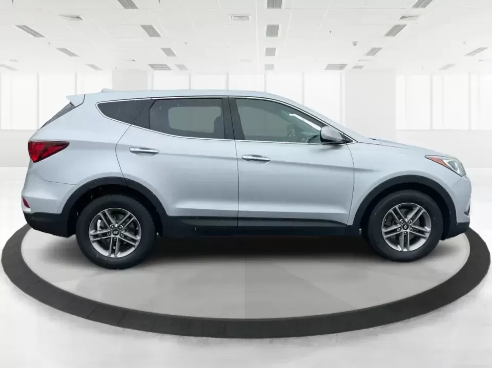 2017 Hyundai Santa Fe 2.4L (5XYZTDLB2HG) with an Theta II 2.4L I-4 gasoline direct injection engine, 6A transmission, located at 8750 N County Rd 25A, Piqua, OH, 45356, (937) 908-9800, 40.164391, -84.232513 - Discover the perfect blend of comfort, capability, and style with the 2017 Hyundai Santa Fe, now available at Advantage Car and Credit, located at 1184 Kauffman Ave, Fairborn, OH 45324. This versatile SUV is an excellent choice for growing families, weekend adventurers, or budget-conscious buyers lo - Photo#1