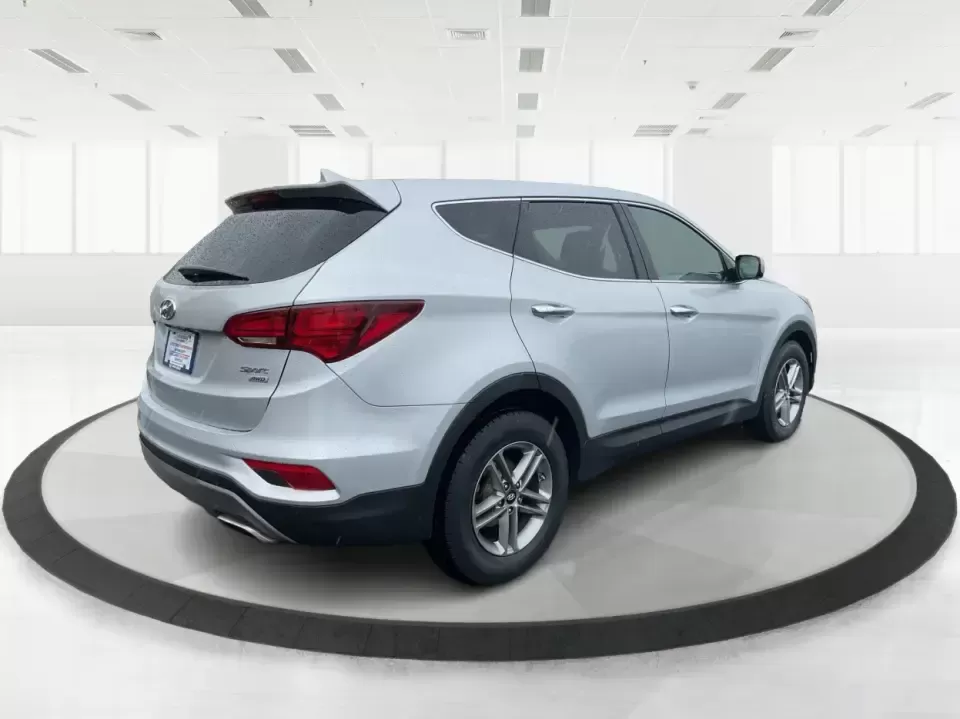 2017 Hyundai Santa Fe 2.4L (5XYZTDLB2HG) with an Theta II 2.4L I-4 gasoline direct injection engine, 6A transmission, located at 8750 N County Rd 25A, Piqua, OH, 45356, (937) 908-9800, 40.164391, -84.232513 - Discover the perfect blend of comfort, capability, and style with the 2017 Hyundai Santa Fe, now available at Advantage Car and Credit, located at 1184 Kauffman Ave, Fairborn, OH 45324. This versatile SUV is an excellent choice for growing families, weekend adventurers, or budget-conscious buyers lo - Photo#2