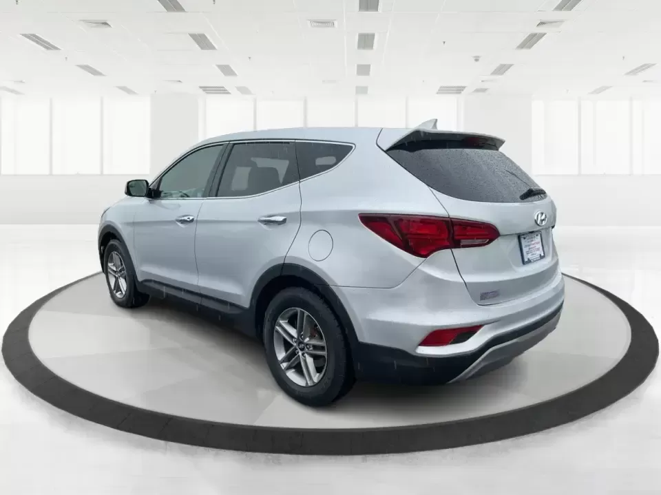 2017 Hyundai Santa Fe 2.4L (5XYZTDLB2HG) with an Theta II 2.4L I-4 gasoline direct injection engine, 6A transmission, located at 8750 N County Rd 25A, Piqua, OH, 45356, (937) 908-9800, 40.164391, -84.232513 - Discover the perfect blend of comfort, capability, and style with the 2017 Hyundai Santa Fe, now available at Advantage Car and Credit, located at 1184 Kauffman Ave, Fairborn, OH 45324. This versatile SUV is an excellent choice for growing families, weekend adventurers, or budget-conscious buyers lo - Photo#4