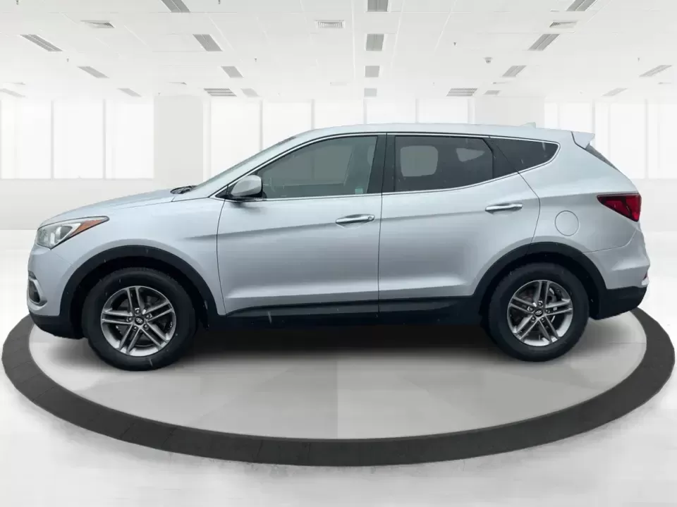 2017 Hyundai Santa Fe 2.4L (5XYZTDLB2HG) with an Theta II 2.4L I-4 gasoline direct injection engine, 6A transmission, located at 8750 N County Rd 25A, Piqua, OH, 45356, (937) 908-9800, 40.164391, -84.232513 - Discover the perfect blend of comfort, capability, and style with the 2017 Hyundai Santa Fe, now available at Advantage Car and Credit, located at 1184 Kauffman Ave, Fairborn, OH 45324. This versatile SUV is an excellent choice for growing families, weekend adventurers, or budget-conscious buyers lo - Photo#5