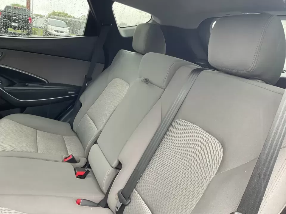 2017 Hyundai Santa Fe 2.4L (5XYZTDLB2HG) with an Theta II 2.4L I-4 gasoline direct injection engine, 6A transmission, located at 8750 N County Rd 25A, Piqua, OH, 45356, (937) 908-9800, 40.164391, -84.232513 - Discover the perfect blend of comfort, capability, and style with the 2017 Hyundai Santa Fe, now available at Advantage Car and Credit, located at 1184 Kauffman Ave, Fairborn, OH 45324. This versatile SUV is an excellent choice for growing families, weekend adventurers, or budget-conscious buyers lo - Photo#10