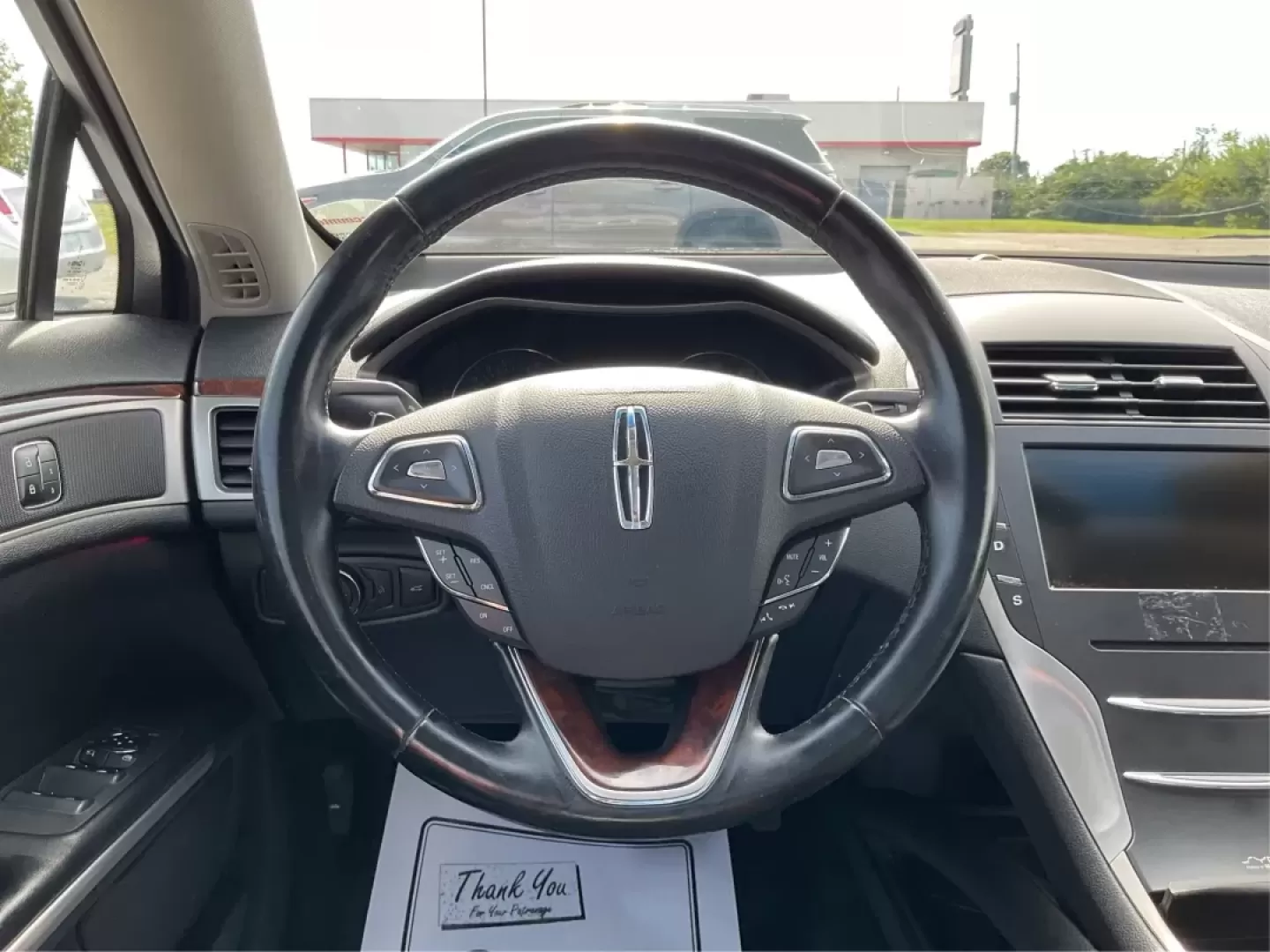 2015 Lincoln MKZ Base (3LN6L2GKXFR) with an Other engine, located at 8750 N County Rd 25A, Piqua, OH, 45356, (937) 908-9800, 40.164391, -84.232513 - **Discover the 2015 Lincoln MKZ: Your Ideal Blend of Luxury and Affordability!** <br /> <br /> Are you searching for a stylish, reliable vehicle that won't break the bank? Look no further than the 2015 Lincoln MKZ, available now at Advantage Car and Credit in Fairborn, OH. This stunning vehicle is p - Photo#16