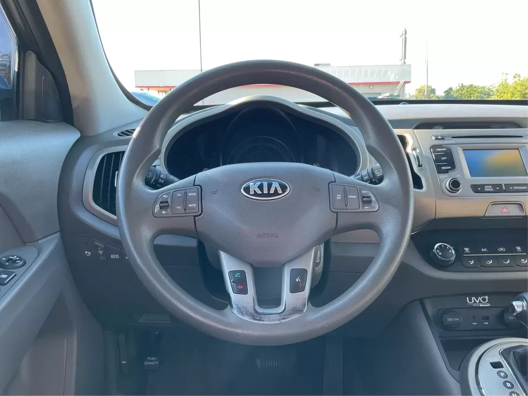 2014 Kia Sportage LX AWD (KNDPBCAC8E7) with an 2.4L V6 DOHC 24V engine, 6-Speed Automatic transmission, located at 4508 South Dixie Dr, Moraine, OH, 45439, (937) 908-9800, 39.689976, -84.218452 - **Adventure Awaits with the 2014 Kia Sportage LX AWD - Your Perfect Crossover Companion!**<br /> <br /> Imagine hitting the open road, whether you're embarking on a scenic weekend getaway or navigating through your daily commute. The 2014 Kia Sportage LX AWD is designed for those who crave versatili - Photo#16