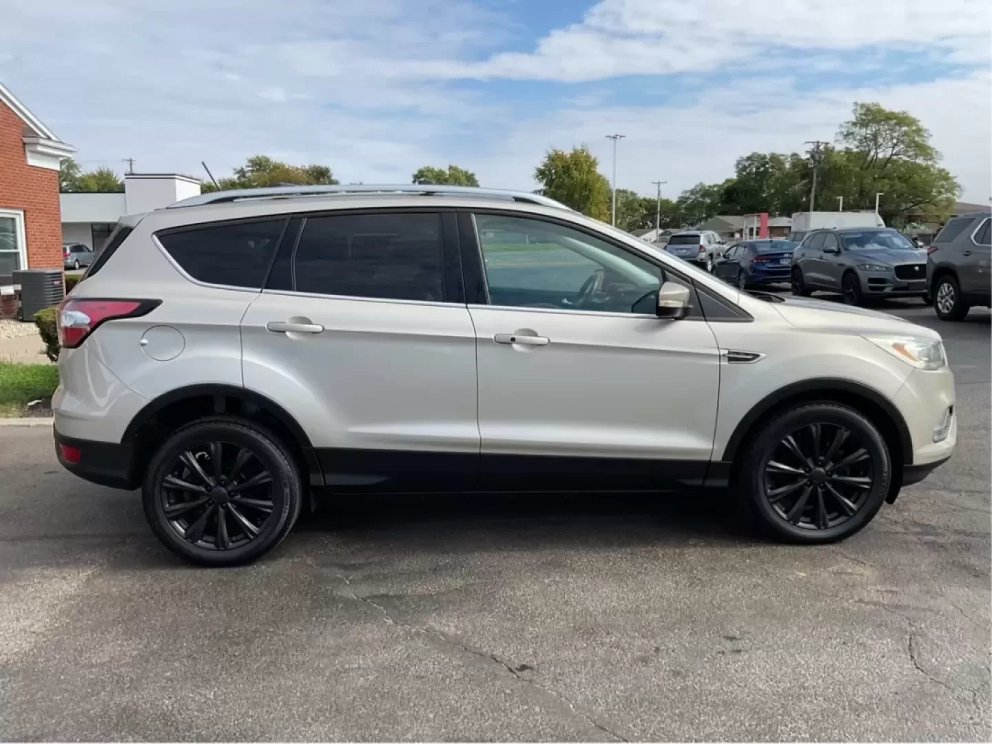 2018 Ford Escape Titanium FWD (1FMCU0J99JU) with an 2.0L L4 DOHC 16V engine, 6-Speed Automatic transmission, located at 1230 East Main St, Xenia, OH, 45385, (937) 908-9800, 39.688026, -83.910172 - Experience the perfect blend of style and practicality with the 2018 Ford Escape Titanium, now available at Advantage Car and Credit in Xenia, OH. This SUV is not just a vehicle; it's your ticket to adventure, whether you're navigating the bustling streets of downtown Xenia or embarking on a weekend - Photo#1