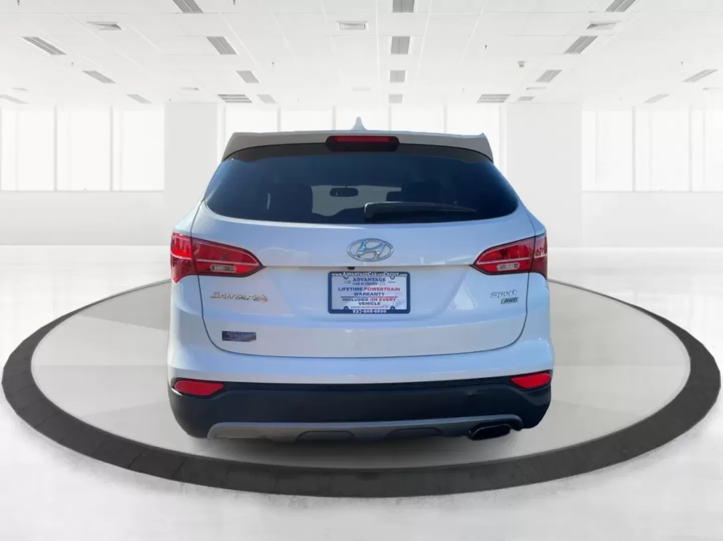 2014 Hyundai Santa Fe 2.4L (5XYZUDLB3EG) with an Theta II 2.4L I-4 gasoline direct injection engine, located at 1099 N County Rd 25A , Troy, OH, 45373, (937) 908-9800, 40.057079, -84.212883 - Are you ready to elevate your driving experience and embrace a lifestyle of adventure? The 2014 Hyundai Santa Fe available at Advantage Car and Credit in Troy, OH, is not just a vehicle; it's your gateway to unforgettable road trips, family outings, and daily commutes. This versatile SUV combines st - Photo#3