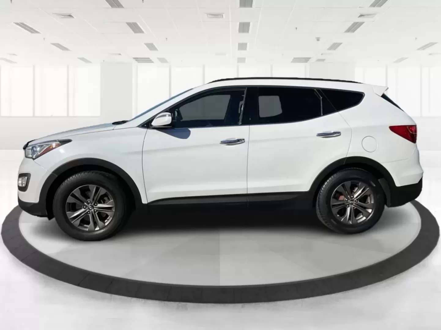 2014 Hyundai Santa Fe 2.4L (5XYZUDLB3EG) with an Theta II 2.4L I-4 gasoline direct injection engine, located at 1099 N County Rd 25A , Troy, OH, 45373, (937) 908-9800, 40.057079, -84.212883 - Are you ready to elevate your driving experience and embrace a lifestyle of adventure? The 2014 Hyundai Santa Fe available at Advantage Car and Credit in Troy, OH, is not just a vehicle; it's your gateway to unforgettable road trips, family outings, and daily commutes. This versatile SUV combines st - Photo#5