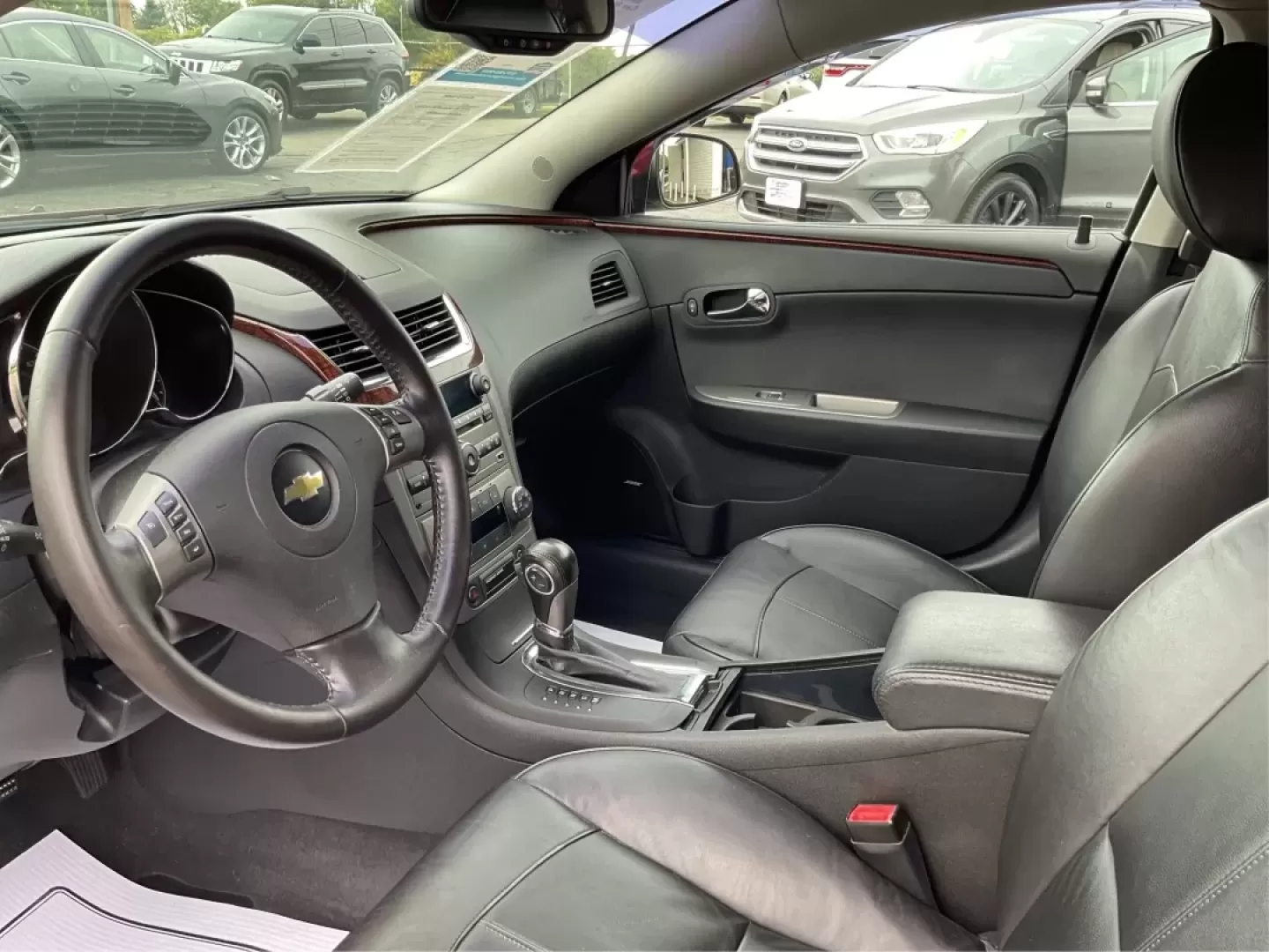 2012 Chevrolet Malibu 2LZ (1G1ZG5E73CF) with an 3.6L V-6 DOHC engine, located at 8750 N County Rd 25A, Piqua, OH, 45356, (937) 908-9800, 40.164391, -84.232513 - Experience the thrill of the open road with the 2012 Chevrolet Malibu, a vehicle that embodies both style and comfort while offering the reliability you need for everyday life. Whether you're a growing family looking for a reliable sedan for school runs and weekend getaways or a budget-conscious pro - Photo#9