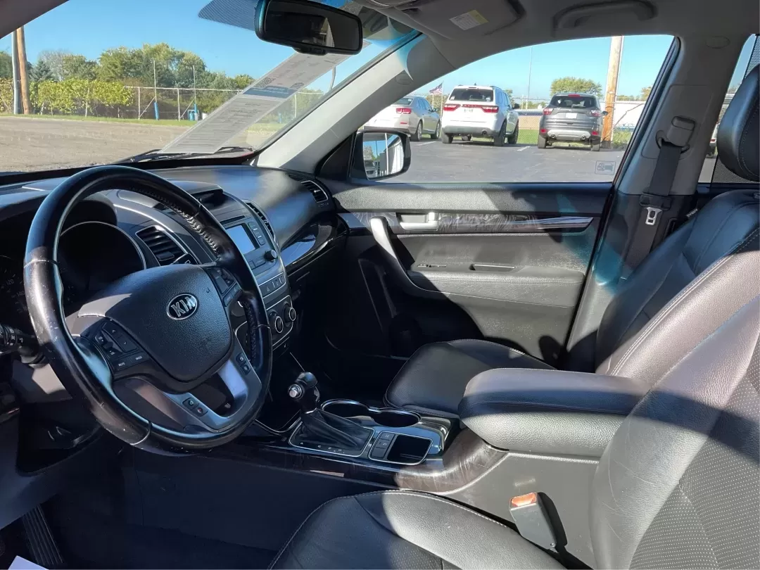 2015 Kia Sorento LX (5XYKTCA66FG) with an 2.4L I-4 gasoline direct injection engine, located at 4508 South Dixie Dr, Moraine, OH, 45439, (937) 908-9800, 39.689976, -84.218452 - **Adventure Awaits with the 2015 Kia Sorento LX from Advantage Car and Credit!**<br /> <br /> Are you ready to elevate your family outings or embark on unforgettable weekend adventures? Look no further than this stunning **2015 Kia Sorento LX**! With its striking Remington Red Metallic exterior and - Photo#9