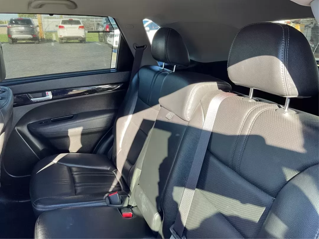 2015 Kia Sorento LX (5XYKTCA66FG) with an 2.4L I-4 gasoline direct injection engine, located at 4508 South Dixie Dr, Moraine, OH, 45439, (937) 908-9800, 39.689976, -84.218452 - **Adventure Awaits with the 2015 Kia Sorento LX from Advantage Car and Credit!**<br /> <br /> Are you ready to elevate your family outings or embark on unforgettable weekend adventures? Look no further than this stunning **2015 Kia Sorento LX**! With its striking Remington Red Metallic exterior and - Photo#10