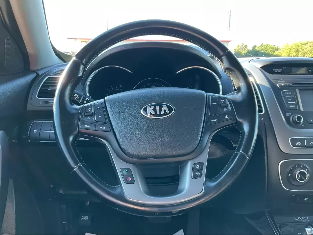2015 Kia Sorento LX (5XYKTCA66FG) with an 2.4L I-4 gasoline direct injection engine, located at 4508 South Dixie Dr, Moraine, OH, 45439, (937) 908-9800, 39.689976, -84.218452 - **Adventure Awaits with the 2015 Kia Sorento LX from Advantage Car and Credit!**<br /> <br /> Are you ready to elevate your family outings or embark on unforgettable weekend adventures? Look no further than this stunning **2015 Kia Sorento LX**! With its striking Remington Red Metallic exterior and - Photo#16