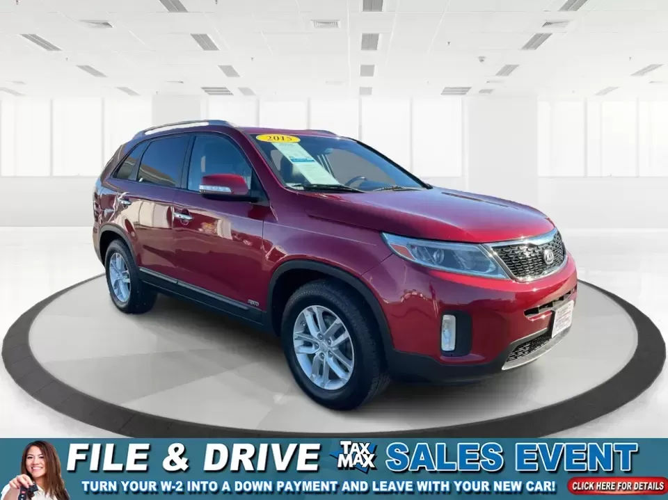 2015 Kia Sorento LX (5XYKTCA66FG) with an 2.4L I-4 gasoline direct injection engine, 6-Speed Automatic transmission, located at 8750 N County Rd 25A, Piqua, OH, 45356, (937) 908-9800, 40.164391, -84.232513 - **Adventure Awaits with the 2015 Kia Sorento LX from Advantage Car and Credit!**<br /> <br /> Are you ready to elevate your family outings or embark on unforgettable weekend adventures? Look no further than this stunning **2015 Kia Sorento LX**! With its striking Remington Red Metallic exterior and - Photo#0