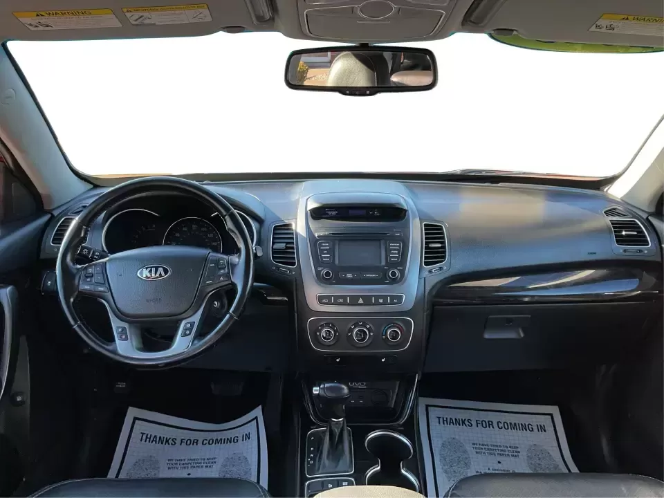 2015 Kia Sorento LX (5XYKTCA66FG) with an 2.4L I-4 gasoline direct injection engine, 6-Speed Automatic transmission, located at 8750 N County Rd 25A, Piqua, OH, 45356, (937) 908-9800, 40.164391, -84.232513 - **Adventure Awaits with the 2015 Kia Sorento LX from Advantage Car and Credit!**<br /> <br /> Are you ready to elevate your family outings or embark on unforgettable weekend adventures? Look no further than this stunning **2015 Kia Sorento LX**! With its striking Remington Red Metallic exterior and - Photo#19