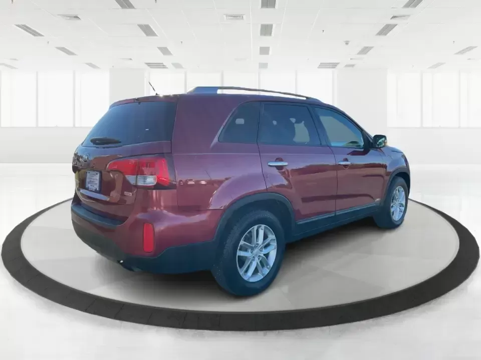 2015 Kia Sorento LX (5XYKTCA66FG) with an 2.4L I-4 gasoline direct injection engine, 6-Speed Automatic transmission, located at 4508 South Dixie Dr, Moraine, OH, 45439, (937) 908-9800, 39.689976, -84.218452 - **Adventure Awaits with the 2015 Kia Sorento LX from Advantage Car and Credit!**<br /> <br /> Are you ready to elevate your family outings or embark on unforgettable weekend adventures? Look no further than this stunning **2015 Kia Sorento LX**! With its striking Remington Red Metallic exterior and - Photo#2