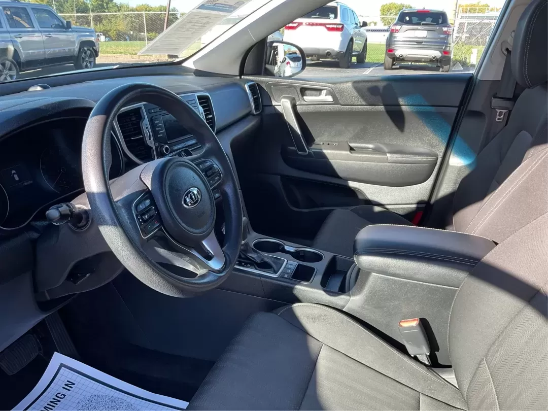 2017 Kia Sportage LX (KNDPMCAC2H7) with an Theta II 2.4L I-4 gasoline direct injection engine, located at 401 Woodman Dr, Riverside, OH, 45431, (937) 908-9800, 39.760899, -84.123421 - **Discover Your Next Adventure with the 2017 Kia Sportage LX at Advantage Car and Credit Riverside!**<br /> <br /> Looking for a reliable vehicle that perfectly balances comfort, style, and performance for your next family road trip or daily commute? The 2017 Kia Sportage LX is more than just a cro - Photo#9