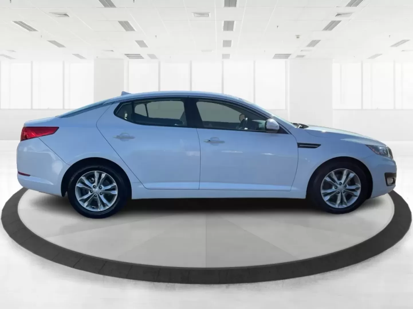 2012 Kia Optima EX (5XXGN4A70CG) with an 2.4L I-4 gasoline direct injection engine, located at 1099 N County Rd 25A , Troy, OH, 45373, (937) 908-9800, 40.057079, -84.212883 - Elevate your driving experience with this stunning 2012 Kia Optima EX, a perfect blend of style, comfort, and reliability. Ideal for budget-conscious buyers and growing families alike, this sedan is designed to meet your daily commuting needs while offering the space and features essential for both - Photo#1