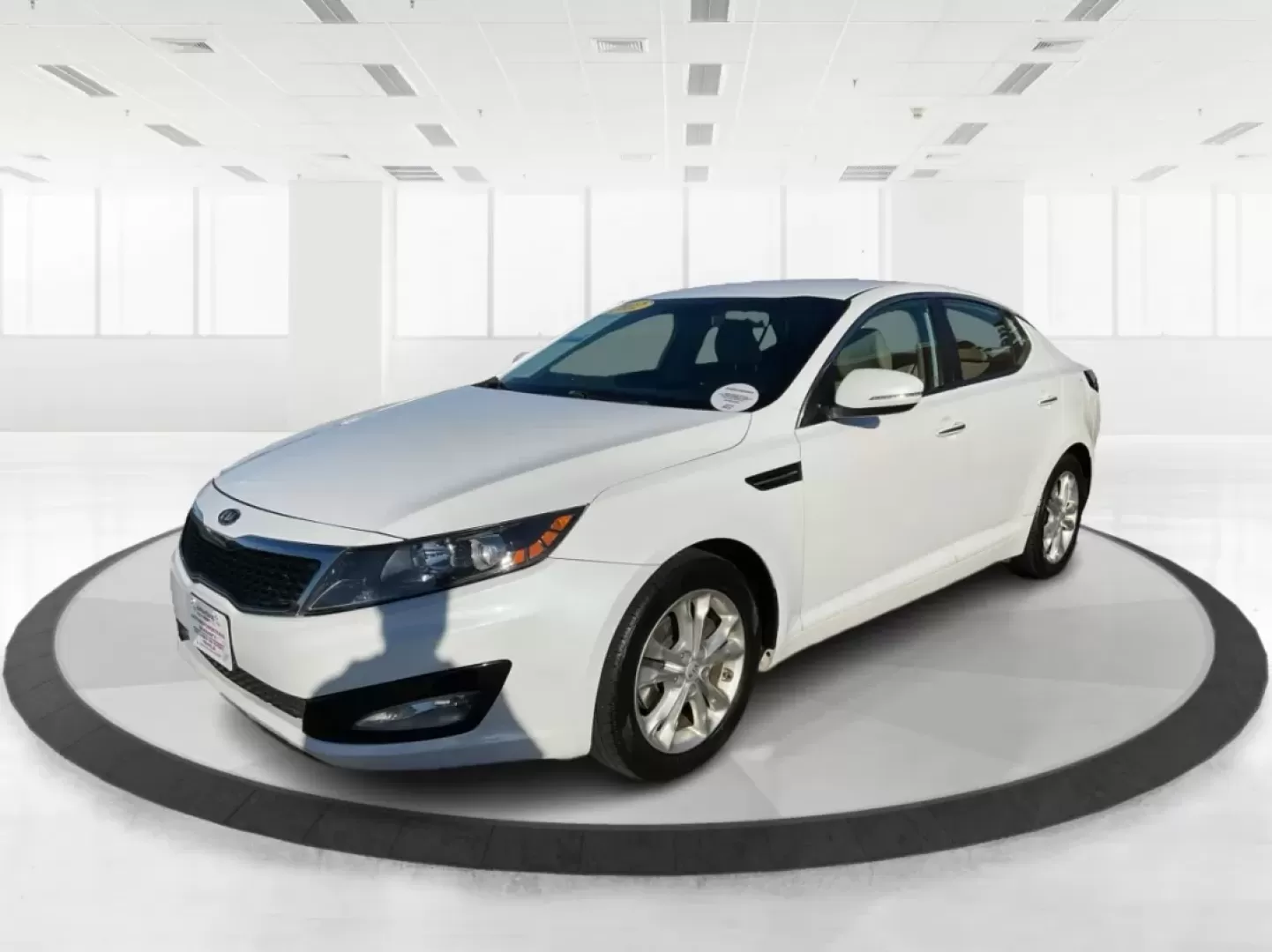 2012 Kia Optima EX (5XXGN4A70CG) with an 2.4L I-4 gasoline direct injection engine, located at 1099 N County Rd 25A , Troy, OH, 45373, (937) 908-9800, 40.057079, -84.212883 - Elevate your driving experience with this stunning 2012 Kia Optima EX, a perfect blend of style, comfort, and reliability. Ideal for budget-conscious buyers and growing families alike, this sedan is designed to meet your daily commuting needs while offering the space and features essential for both - Photo#8