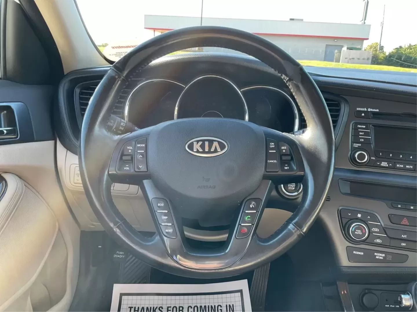 2012 Kia Optima EX (5XXGN4A70CG) with an 2.4L I-4 gasoline direct injection engine, located at 1951 S Dayton Lakeview Rd., New Carlisle, OH, 45344, (937) 908-9800, 39.890999, -84.050255 - Elevate your driving experience with this stunning 2012 Kia Optima EX, a perfect blend of style, comfort, and reliability. Ideal for budget-conscious buyers and growing families alike, this sedan is designed to meet your daily commuting needs while offering the space and features essential for both - Photo#16