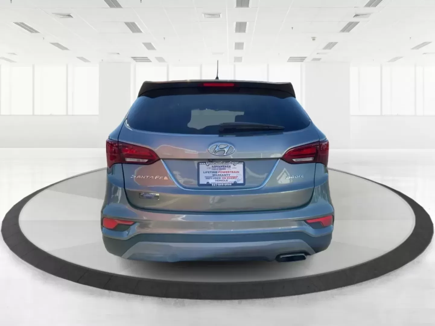 2018 Hyundai Santa Fe 2.4L (5XYZT3LB6JG) with an Theta II 2.4L I-4 gasoline direct injection engine, located at 4508 South Dixie Dr, Moraine, OH, 45439, (937) 908-9800, 39.689976, -84.218452 - Elevate your family adventures and daily commutes with the remarkable 2018 Hyundai Santa Fe, now available at Advantage Car and Credit - Moraine. This SUV is designed to seamlessly fit into your lifestyle, whether you're navigating busy streets, embarking on weekend getaways, or tackling the challen - Photo#3