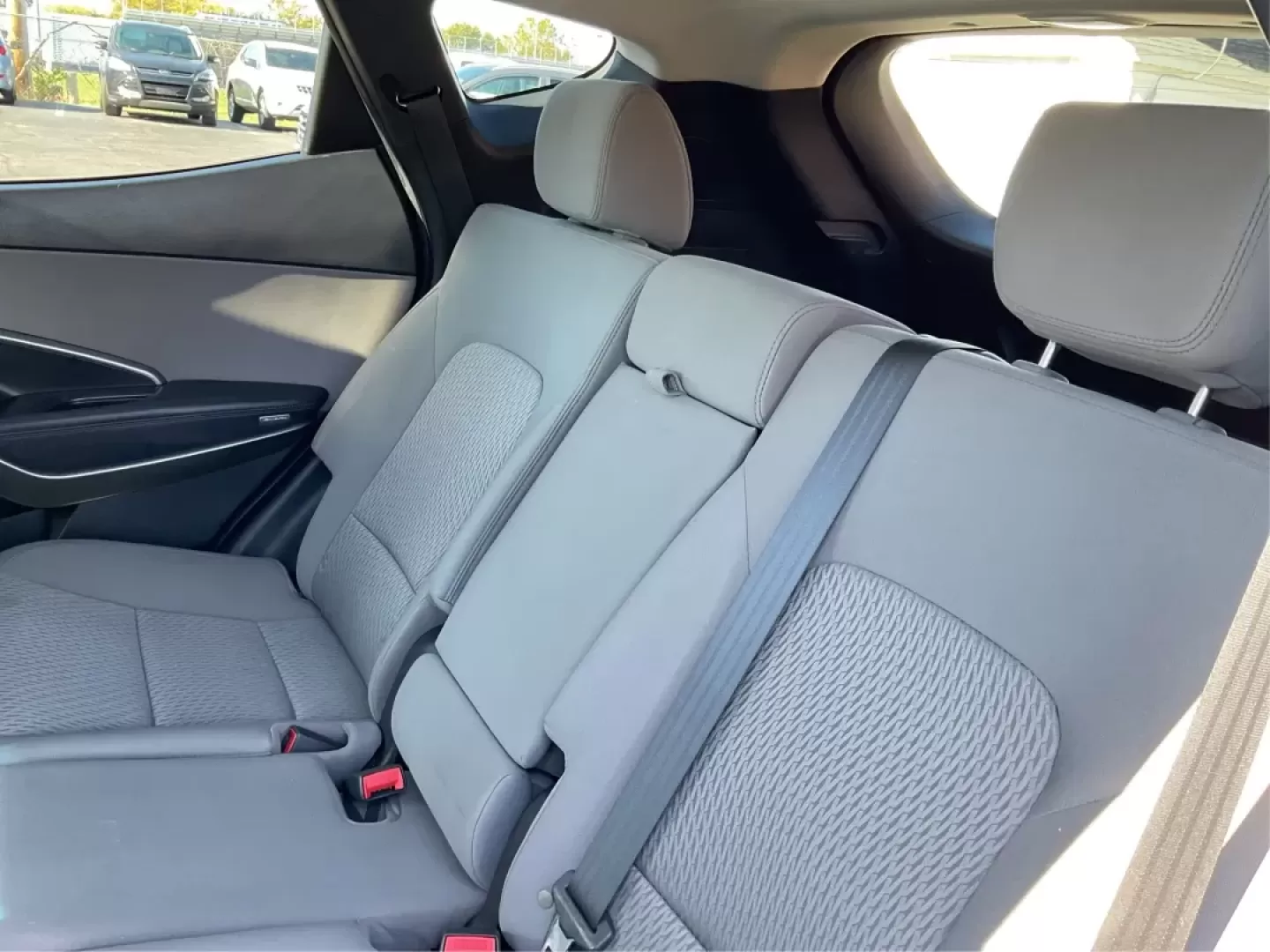 2018 Hyundai Santa Fe 2.4L (5XYZT3LB6JG) with an Theta II 2.4L I-4 gasoline direct injection engine, located at 4508 South Dixie Dr, Moraine, OH, 45439, (937) 908-9800, 39.689976, -84.218452 - Elevate your family adventures and daily commutes with the remarkable 2018 Hyundai Santa Fe, now available at Advantage Car and Credit - Moraine. This SUV is designed to seamlessly fit into your lifestyle, whether you're navigating busy streets, embarking on weekend getaways, or tackling the challen - Photo#10