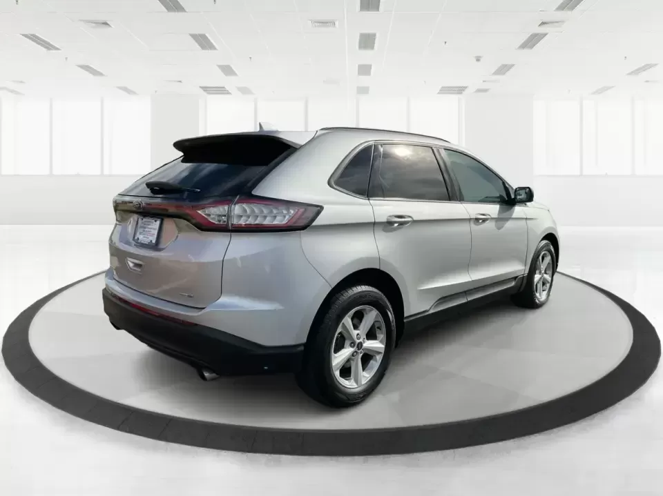 2016 Ford Edge SE (2FMPK4G9XGB) with an EcoBoost 2L I-4 gasoline direct injection engine, 6A transmission, located at 1099 N County Rd 25A , Troy, OH, 45373, (937) 908-9800, 40.057079, -84.212883 - Rev up your lifestyle with the perfect blend of style, comfort, and utility that the 2016 Ford Edge SE offers! If you're looking for a reliable SUV that seamlessly fits into your busy life-whether it's taking the kids to school, embarking on family adventures, or handling your daily commute-this veh - Photo#2