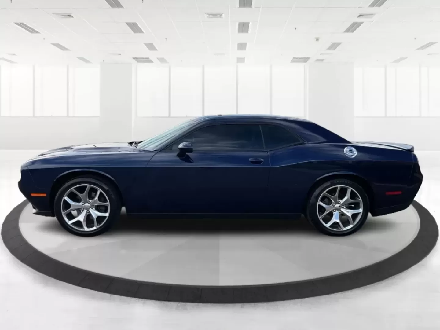 2015 Dodge Challenger SXT Plus (2C3CDZBG5FH) with an 3.6L V-6 DOHC engine, located at 8750 N County Rd 25A, Piqua, OH, 45356, (937) 908-9800, 40.164391, -84.232513 - Unleash your inner muscle car enthusiast with this striking 2015 Dodge Challenger SXT Plus, available now at Advantage Car and Credit in New Carlisle, OH! With its powerful yet efficient 3.6L V-6 DOHC engine, this coupe is perfect for weekend adventures, cruising down scenic routes, or standing out - Photo#5