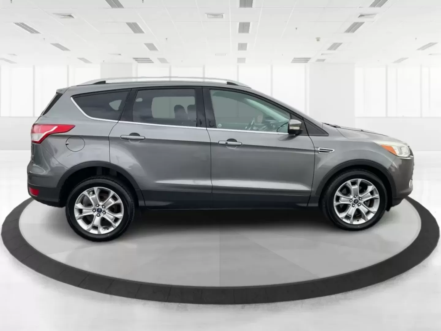 2014 Ford Escape Titanium (1FMCU9J97EU) with an Other engine, located at 401 Woodman Dr, Riverside, OH, 45431, (937) 908-9800, 39.760899, -84.123421 - **Upgrade Your Adventures with the 2014 Ford Escape Titanium at Advantage Car and Credit - Riverside!**<br /> <br /> Are you ready to elevate your weekend getaways or daily commutes with a versatile and stylish SUV? Look no further than the 2014 Ford Escape Titanium, available now at Advantage Car a - Photo#1