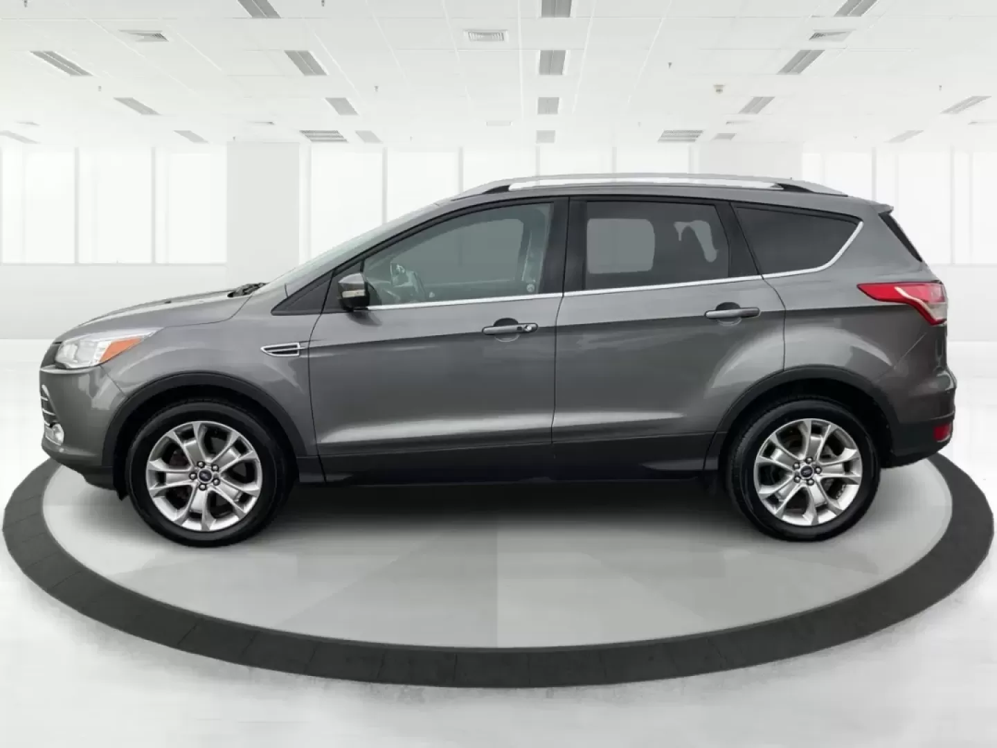 2014 Ford Escape Titanium (1FMCU9J97EU) with an Other engine, located at 401 Woodman Dr, Riverside, OH, 45431, (937) 908-9800, 39.760899, -84.123421 - **Upgrade Your Adventures with the 2014 Ford Escape Titanium at Advantage Car and Credit - Riverside!**<br /> <br /> Are you ready to elevate your weekend getaways or daily commutes with a versatile and stylish SUV? Look no further than the 2014 Ford Escape Titanium, available now at Advantage Car a - Photo#5