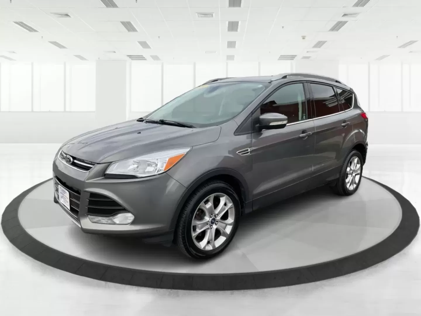 2014 Ford Escape Titanium (1FMCU9J97EU) with an Other engine, located at 401 Woodman Dr, Riverside, OH, 45431, (937) 908-9800, 39.760899, -84.123421 - **Upgrade Your Adventures with the 2014 Ford Escape Titanium at Advantage Car and Credit - Riverside!**<br /> <br /> Are you ready to elevate your weekend getaways or daily commutes with a versatile and stylish SUV? Look no further than the 2014 Ford Escape Titanium, available now at Advantage Car a - Photo#8