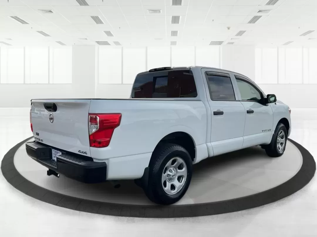 2021 Nissan TITAN Crew Cab S 4x4 (1N6AA1EC4MN) with an Endurance 5.6L V-8 gasoline direct injection engine, 9A transmission, located at 1099 N County Rd 25A , Troy, OH, 45373, (937) 908-9800, 40.057079, -84.212883 - Discover ultimate versatility and rugged capability with this 2021 Nissan TITAN Crew Cab S 4x4, now available at Advantage Car and Credit in Piqua, OH. Whether you're navigating the bustling streets of Piqua or heading out for weekend adventures, this truck is designed to adapt to your lifestyle. Pe - Photo#2