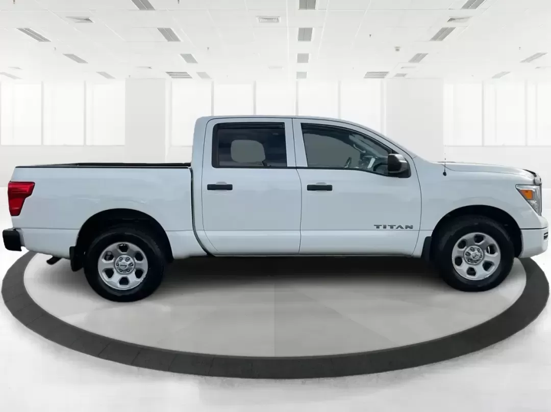 2021 Nissan TITAN Crew Cab S 4x4 (1N6AA1EC4MN) with an Endurance 5.6L V-8 gasoline direct injection engine, 9A transmission, located at 4508 South Dixie Dr, Moraine, OH, 45439, (937) 908-9800, 39.689976, -84.218452 - Discover ultimate versatility and rugged capability with this 2021 Nissan TITAN Crew Cab S 4x4, now available at Advantage Car and Credit in Piqua, OH. Whether you're navigating the bustling streets of Piqua or heading out for weekend adventures, this truck is designed to adapt to your lifestyle. Pe - Photo#1
