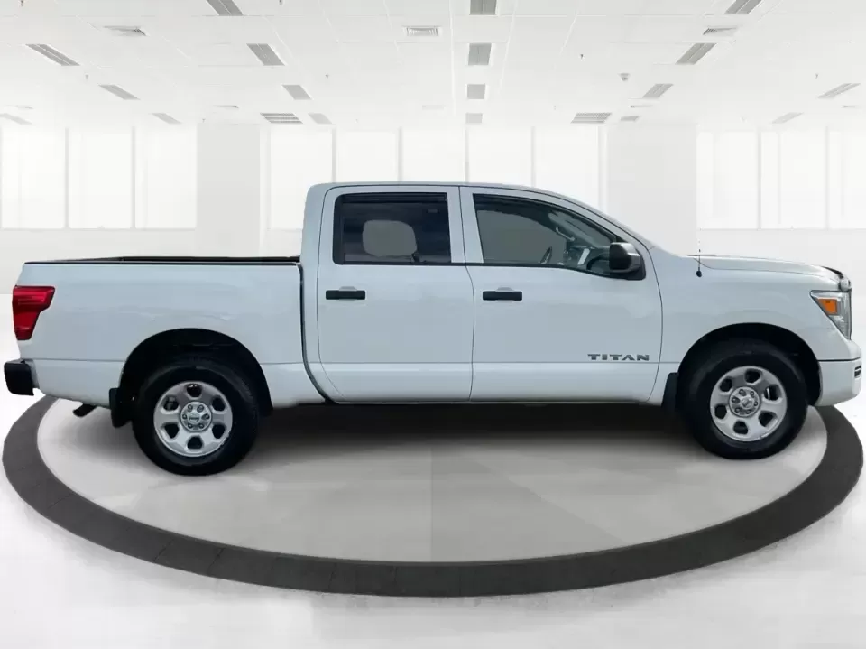 2021 Nissan TITAN Crew Cab S 4x4 (1N6AA1EC4MN) with an Endurance 5.6L V-8 gasoline direct injection engine, 9A transmission, located at 1099 N County Rd 25A , Troy, OH, 45373, (937) 908-9800, 40.057079, -84.212883 - Discover ultimate versatility and rugged capability with this 2021 Nissan TITAN Crew Cab S 4x4, now available at Advantage Car and Credit in Piqua, OH. Whether you're navigating the bustling streets of Piqua or heading out for weekend adventures, this truck is designed to adapt to your lifestyle. Pe - Photo#1
