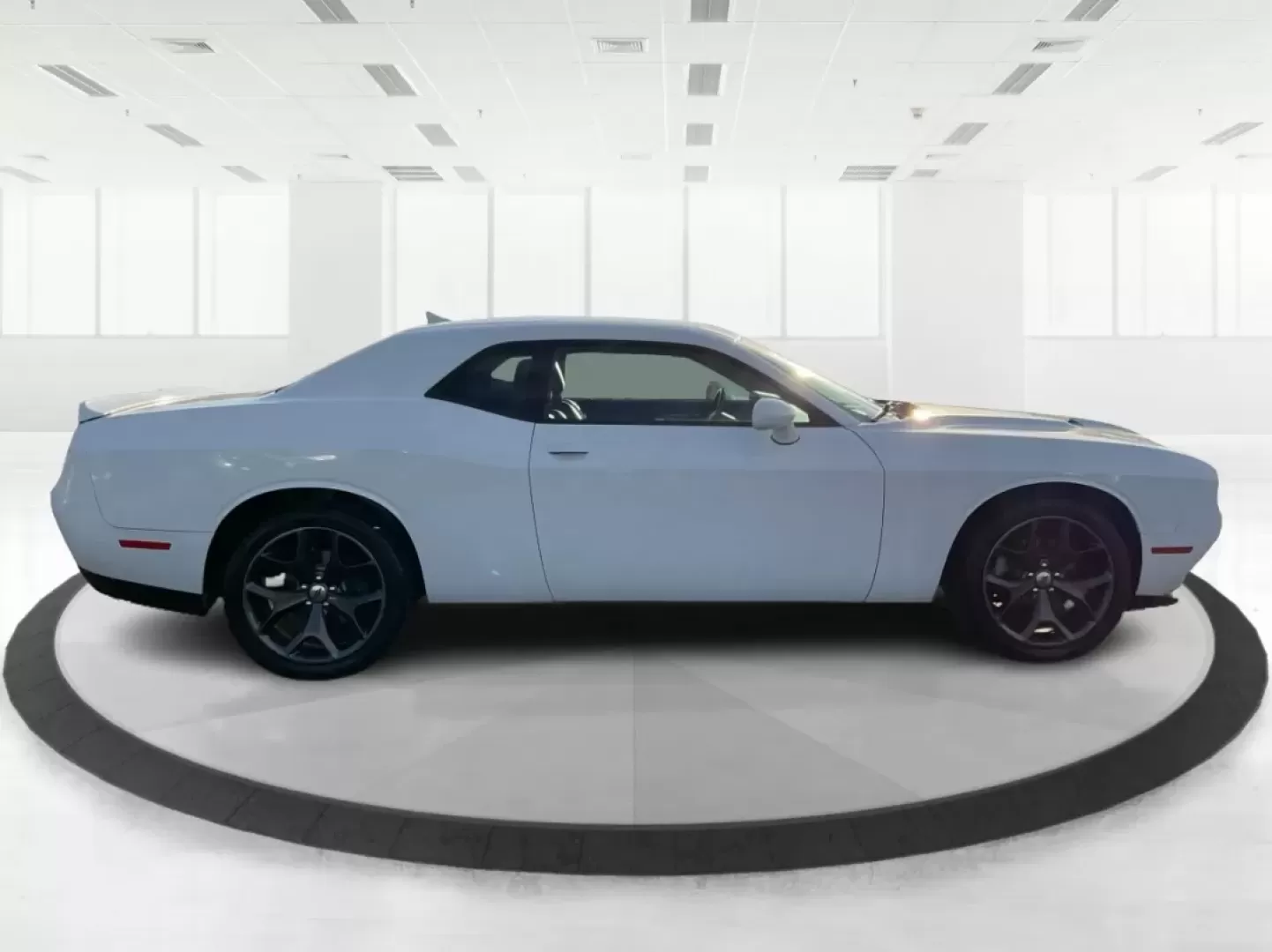 2018 Dodge Challenger SXT Plus (2C3CDZAG0JH) with an Pentastar 3.6L V-6 DOHC engine, located at 8750 N County Rd 25A, Piqua, OH, 45356, (937) 908-9800, 40.164391, -84.232513 - Unleash your inner road warrior with the 2018 Dodge Challenger SXT Plus, the perfect blend of power, style, and everyday functionality. Whether you're tackling the daily commute or planning weekend adventures with friends, this stunning coupe ensures you do it in comfort and confidence. Located at A - Photo#1