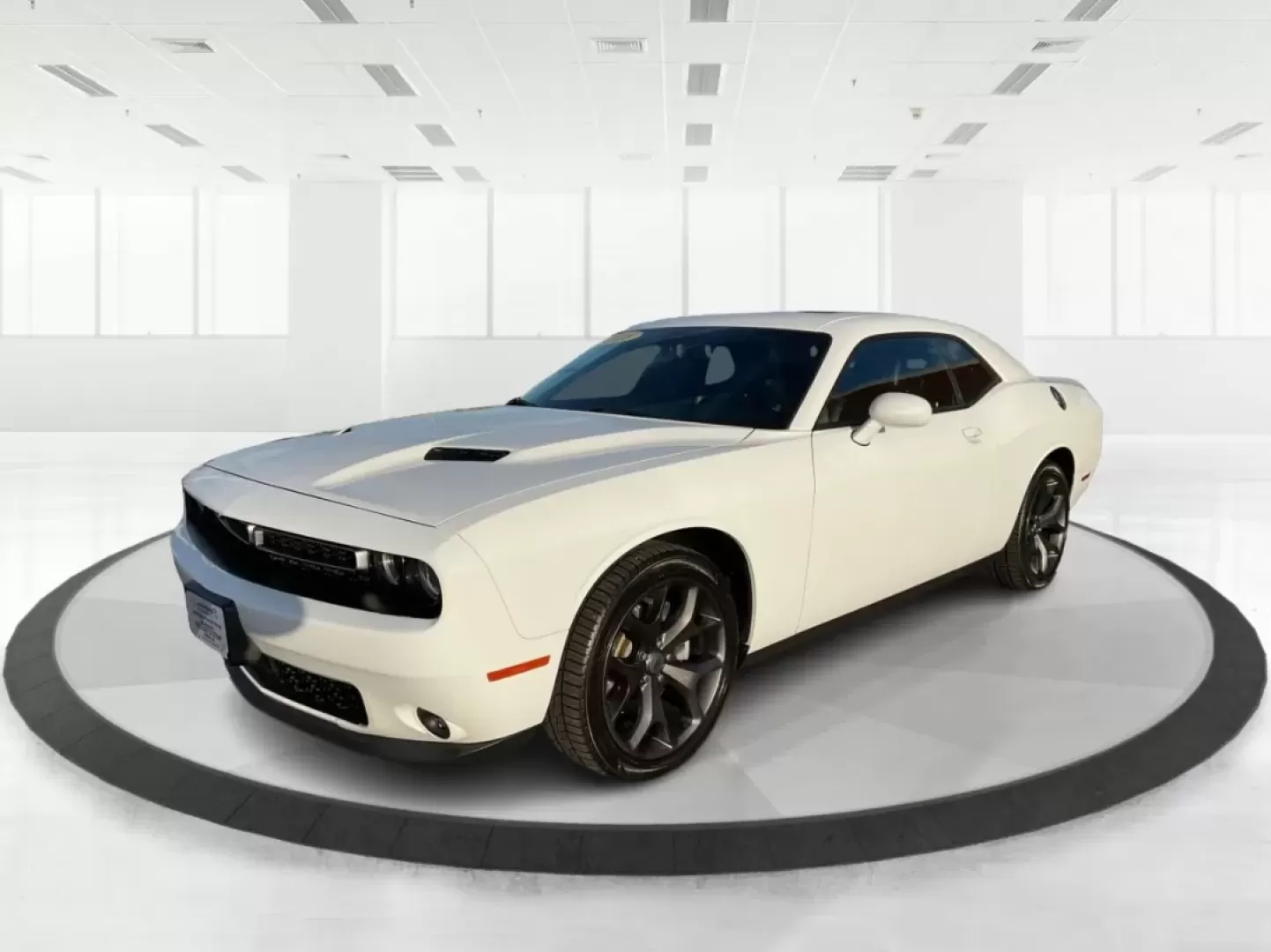 2018 Dodge Challenger SXT Plus (2C3CDZAG0JH) with an Pentastar 3.6L V-6 DOHC engine, located at 8750 N County Rd 25A, Piqua, OH, 45356, (937) 908-9800, 40.164391, -84.232513 - Unleash your inner road warrior with the 2018 Dodge Challenger SXT Plus, the perfect blend of power, style, and everyday functionality. Whether you're tackling the daily commute or planning weekend adventures with friends, this stunning coupe ensures you do it in comfort and confidence. Located at A - Photo#8