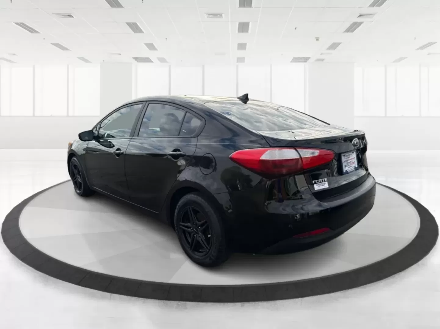 2015 Kia Forte LX (KNAFX4A67F5) with an 1.8L I-4 DOHC engine, 6-Speed Automatic transmission, located at 8750 N County Rd 25A, Piqua, OH, 45356, (937) 908-9800, 40.164391, -84.232513 - Experience the perfect blend of style, comfort, and reliability with the 2015 Kia Forte LX, available now at Advantage Car and Credit in New Carlisle, OH. This sleek sedan is designed to elevate your daily commute and provide the ideal ride for weekend adventures, making it a versatile choice for ev - Photo#4