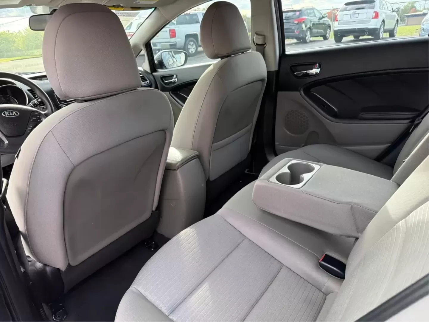 2015 Kia Forte LX (KNAFX4A67F5) with an 1.8L I-4 DOHC engine, 6-Speed Automatic transmission, located at 8750 N County Rd 25A, Piqua, OH, 45356, (937) 908-9800, 40.164391, -84.232513 - Experience the perfect blend of style, comfort, and reliability with the 2015 Kia Forte LX, available now at Advantage Car and Credit in New Carlisle, OH. This sleek sedan is designed to elevate your daily commute and provide the ideal ride for weekend adventures, making it a versatile choice for ev - Photo#10