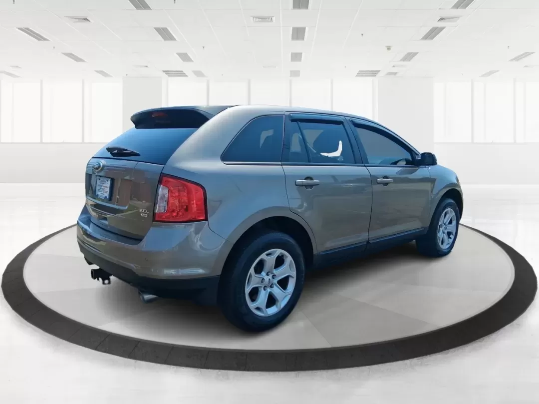 2014 Ford Edge SEL (2FMDK4JCXEB) with an 3.5L V-6 DOHC engine, 6-Speed Automatic transmission, located at 4508 South Dixie Dr, Moraine, OH, 45439, (937) 908-9800, 39.689976, -84.218452 - Are you searching for the perfect vehicle to elevate your family adventures or enhance your daily commute? Look no further! The 2014 Ford Edge SEL is designed to fit every aspect of your lifestyle, whether you're navigating busy city streets, embarking on weekend getaways, or simply running errands - Photo#2