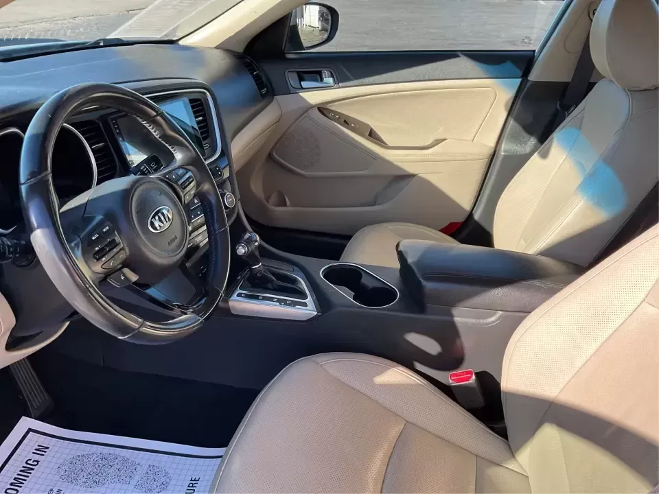 2015 Kia Optima EX (5XXGN4A74FG) with an Theta II 2.4L I-4 gasoline direct injection engine, 6-Speed Automatic transmission, located at 1184 Kauffman Ave, Fairborn, OH, 45324, (937) 908-9800, 39.807072, -84.030914 - Experience the perfect blend of style, comfort, and reliability with this 2015 Kia Optima EX at Advantage Car and Credit in Xenia, OH. Whether you're embarking on daily commutes, family road trips, or simply looking for a trusty companion for your adventures, this vehicle is designed to meet your di - Photo#9