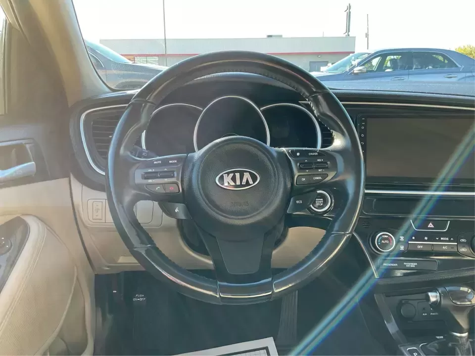 2015 Kia Optima EX (5XXGN4A74FG) with an Theta II 2.4L I-4 gasoline direct injection engine, 6-Speed Automatic transmission, located at 1184 Kauffman Ave, Fairborn, OH, 45324, (937) 908-9800, 39.807072, -84.030914 - Experience the perfect blend of style, comfort, and reliability with this 2015 Kia Optima EX at Advantage Car and Credit in Xenia, OH. Whether you're embarking on daily commutes, family road trips, or simply looking for a trusty companion for your adventures, this vehicle is designed to meet your di - Photo#16