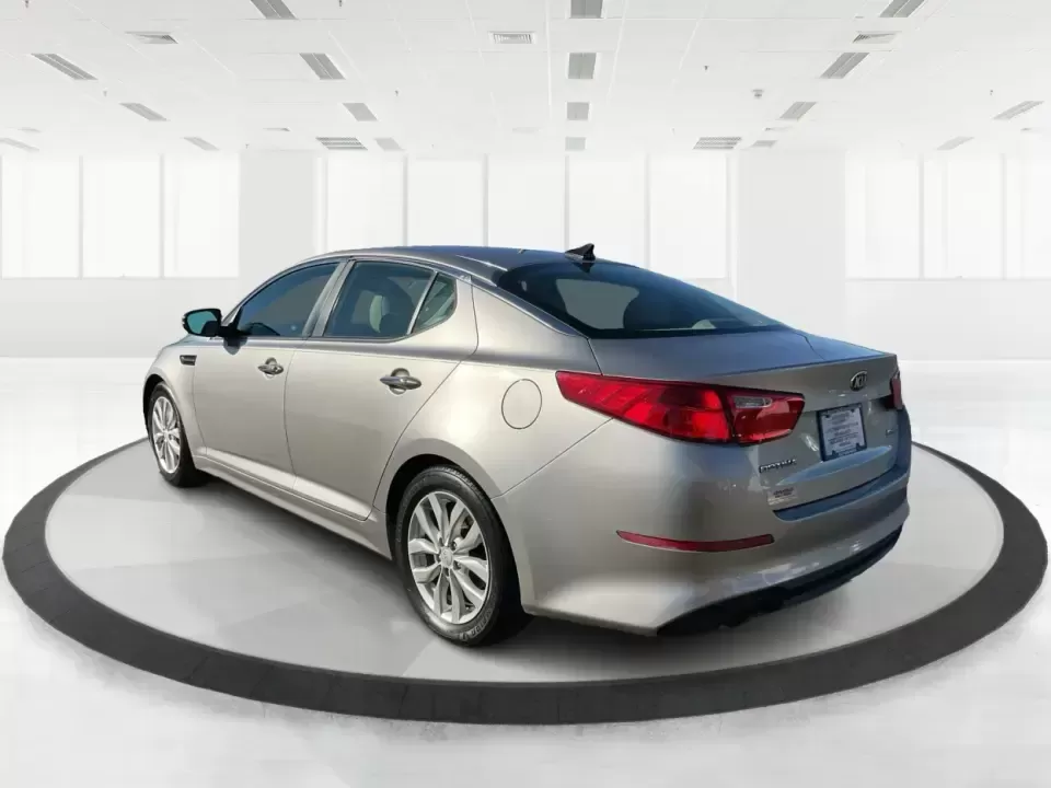 2015 Kia Optima EX (5XXGN4A74FG) with an Theta II 2.4L I-4 gasoline direct injection engine, 6-Speed Automatic transmission, located at 1099 N County Rd 25A , Troy, OH, 45373, (937) 908-9800, 40.057079, -84.212883 - Experience the perfect blend of style, comfort, and reliability with this 2015 Kia Optima EX at Advantage Car and Credit in Xenia, OH. Whether you're embarking on daily commutes, family road trips, or simply looking for a trusty companion for your adventures, this vehicle is designed to meet your di - Photo#4